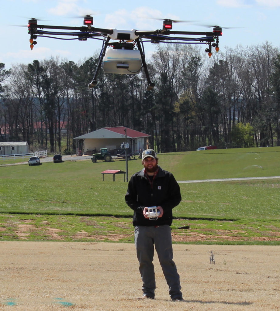 man flying a drone